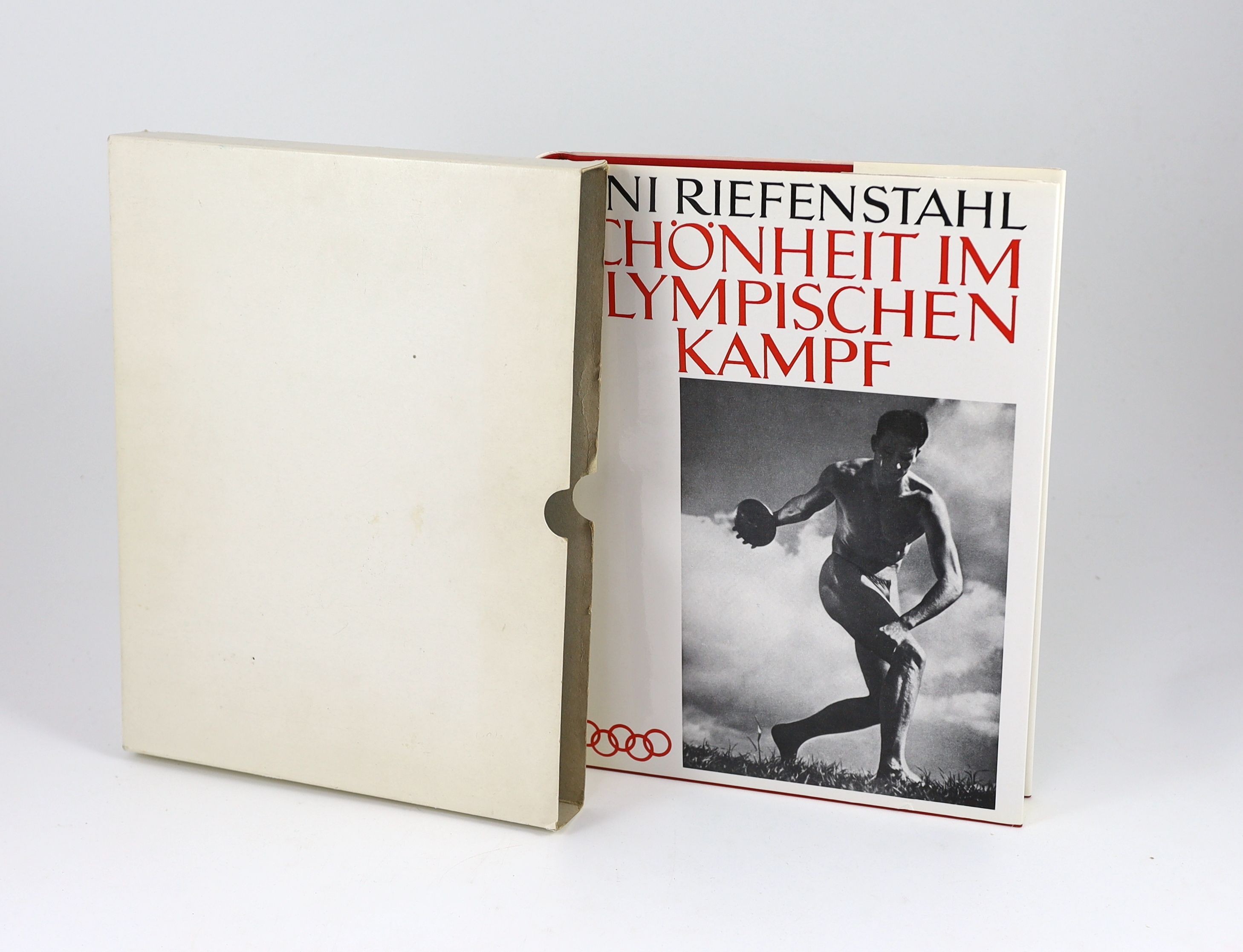 Riefenstahl, Leni - Schönheit im Olympischen Kampf. Complete with numerous text illustrations. Original cloth with gilt letters direct on upper and spine and original pictorial d/j. Folio. Mahnert Lueg, Munich, 1988. Wit